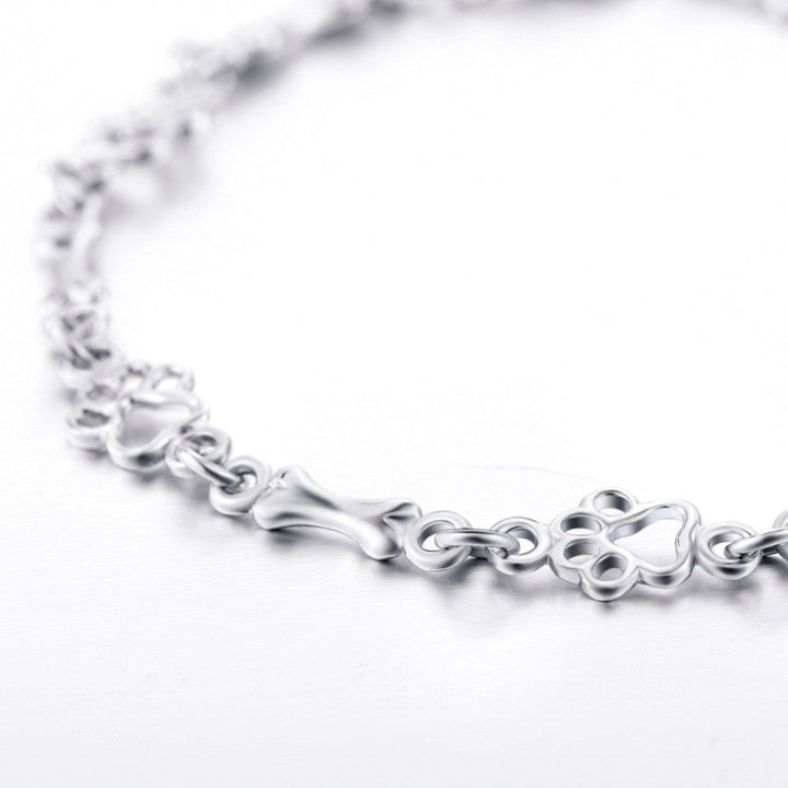 Bracelet avec Pendentifs de Patte de Chien et Os en Argent Pur, Édition Limitée