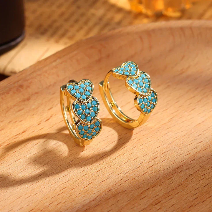 Boucles d'oreilles créoles turquoise chic avec design floral