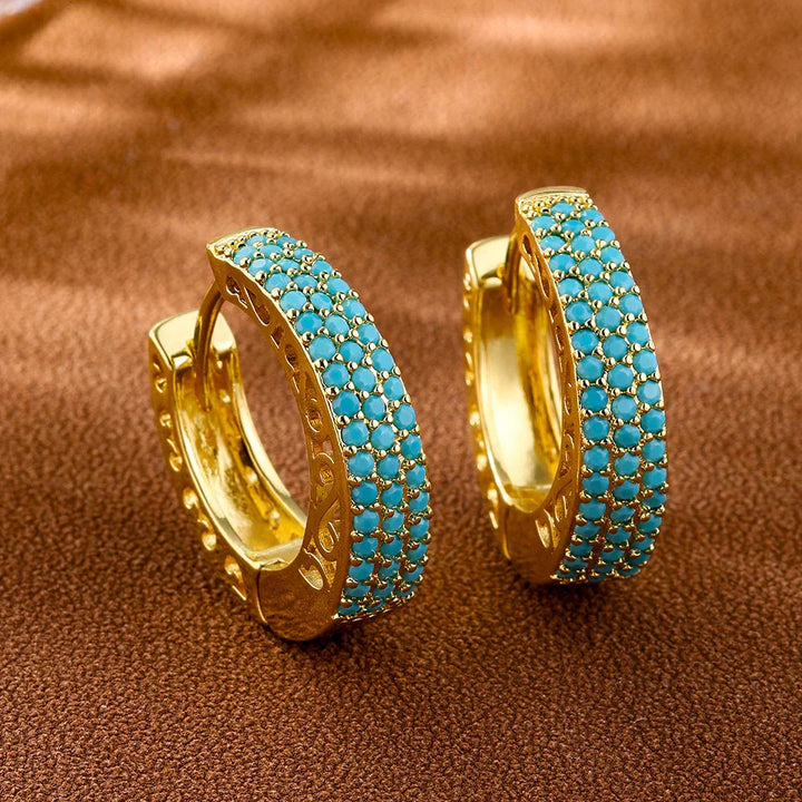 Boucles d'oreilles créoles turquoise chic avec design floral