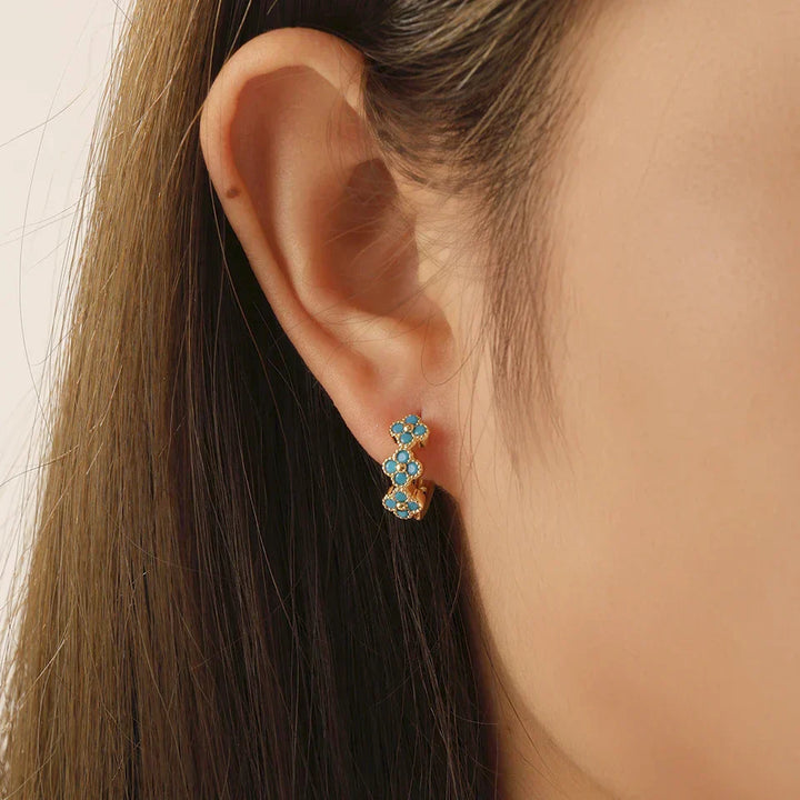 Boucles d'oreilles créoles turquoise chic avec design floral