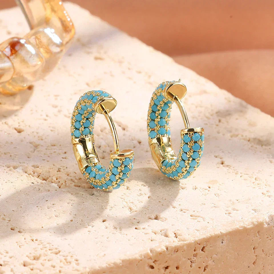 Boucles d'oreilles créoles turquoise chic avec design floral