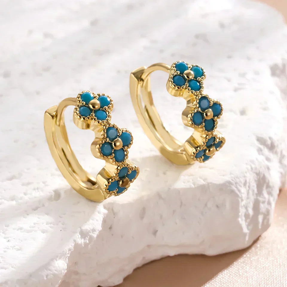 Boucles d'oreilles créoles turquoise chic avec design floral