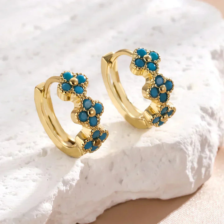 Boucles d'oreilles créoles turquoise chic avec design floral