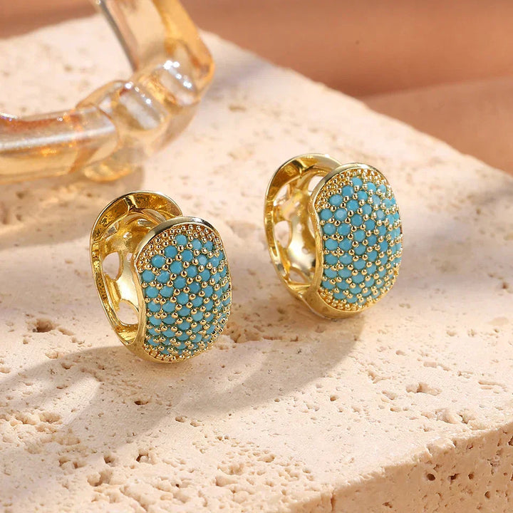 Boucles d'oreilles créoles turquoise chic avec design floral