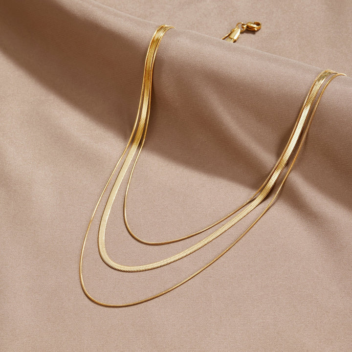Antonie – Collier en or multicouche avec une structure transparente