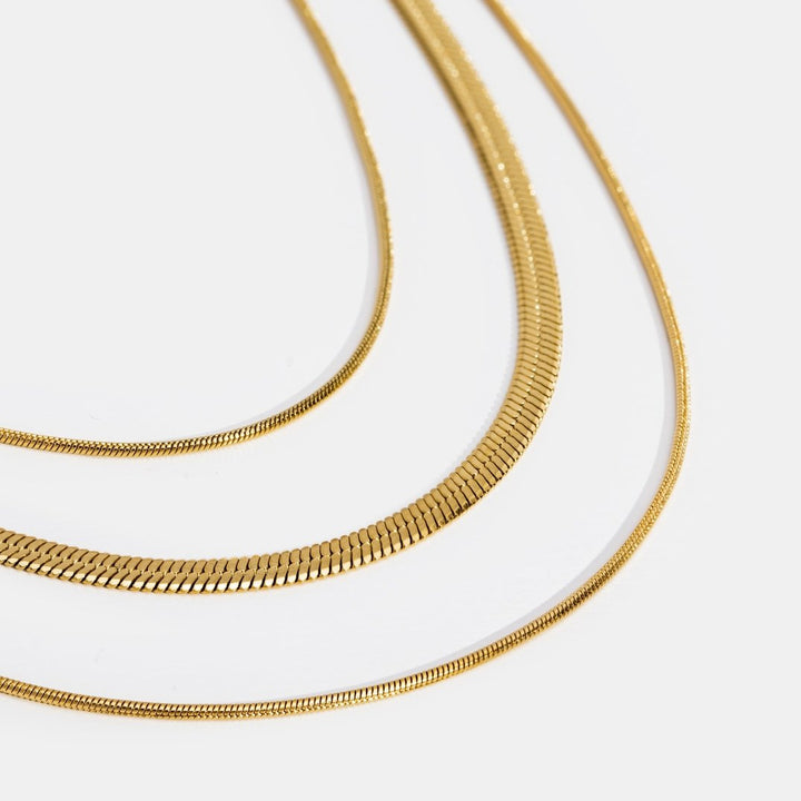 Antonie – Collier en or multicouche avec une structure transparente