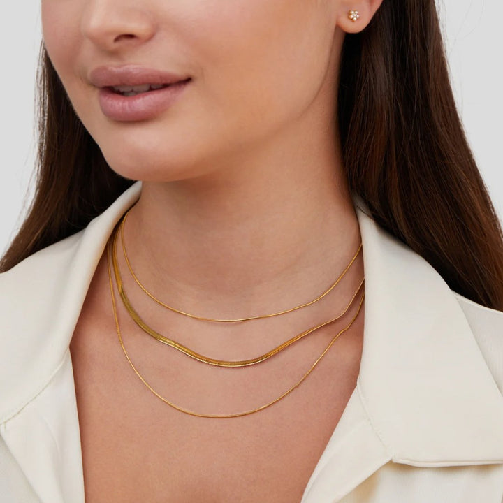 Antonie – Collier en or multicouche avec une structure transparente
