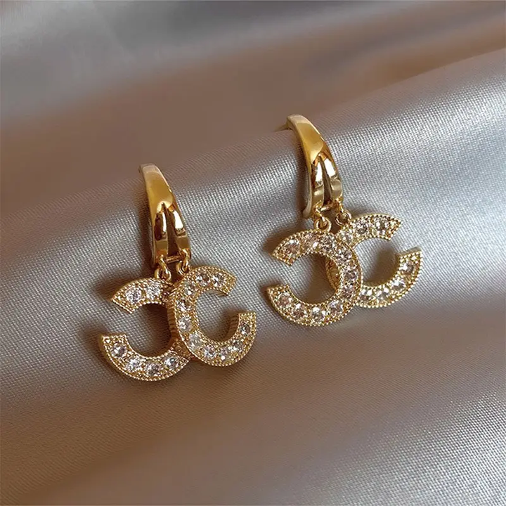 Boucles d'Oreilles Signature Brillantes