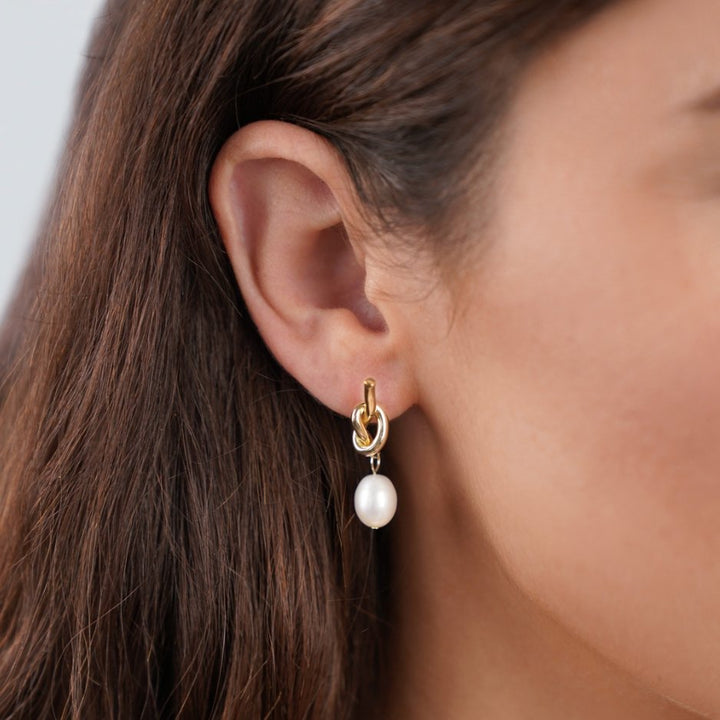 Tereza-Sofie – Boucles d'oreilles en argent de forme courbe.