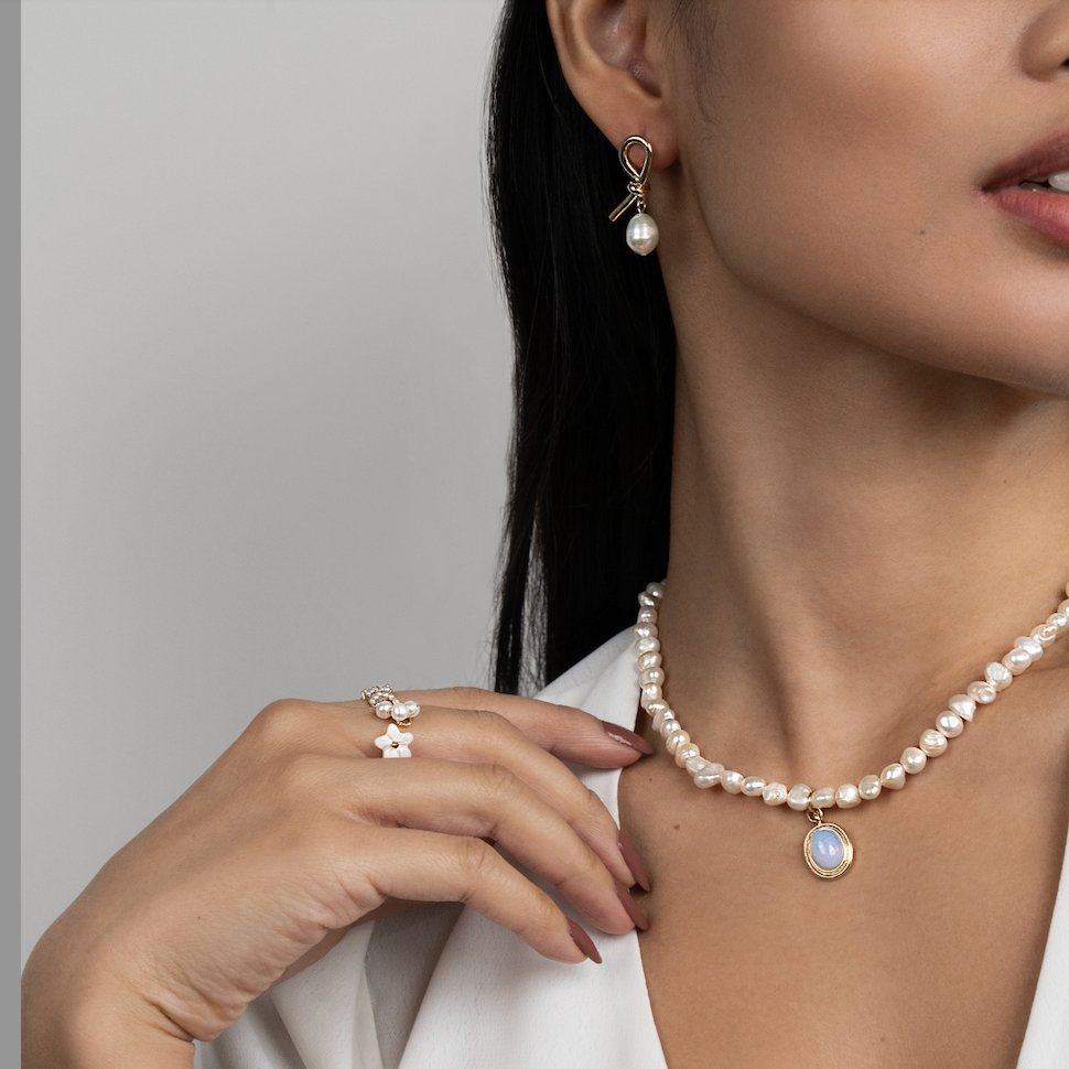 Tereza-Sofie – Boucles d'oreilles en argent de forme courbe.