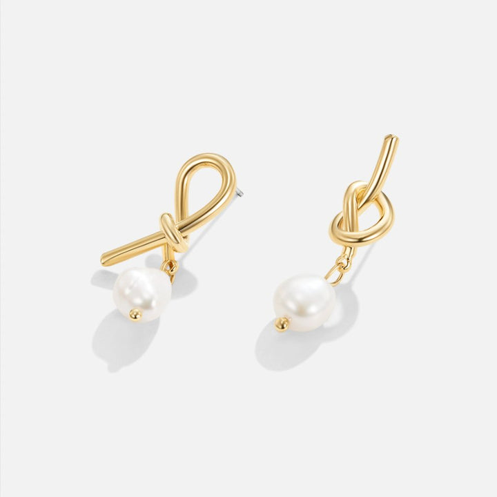 Tereza-Sofie – Boucles d'oreilles en argent de forme courbe.
