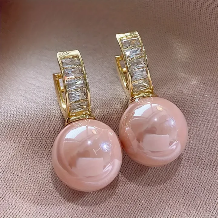 Boucles d'oreilles en or avec zircon rose perle